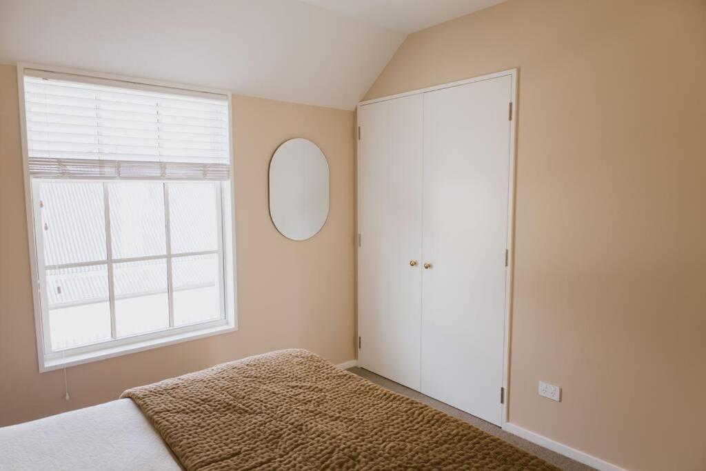 Charming City Central Coach House Apartment